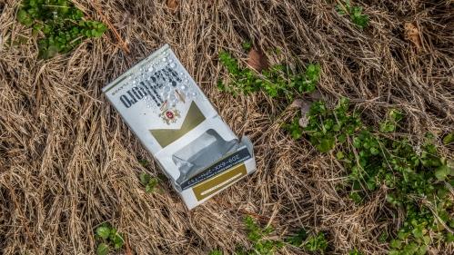 cigarette pack on ground