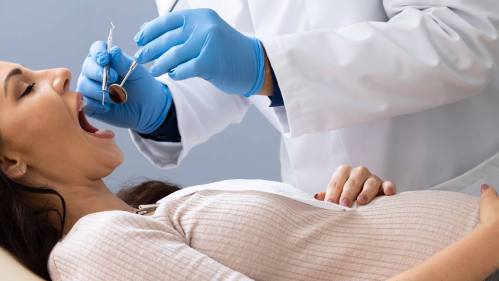 pregnant woman at dentist