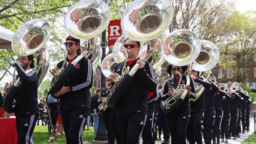 Members of the Marching Scarlet Knights perform on the College Avenue campus during Rutgers Day 2024.