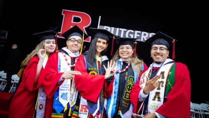 Grads in front of stage