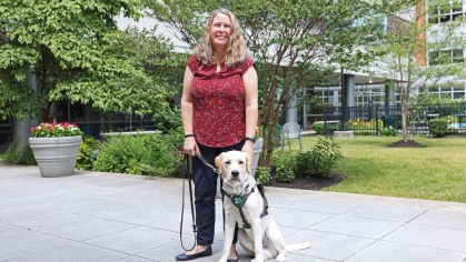 Cassandra Burrows and a seeing eye dog