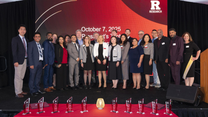 Rutgers Office for Research team members tanding on the stage at the 2025 Rutgers Innovation Awards ceremony