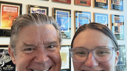 Tina Henry and P. Ashley Wackym, a surgical otologist-neurotologist at Rutgers Robert Wood Johnson Medical School