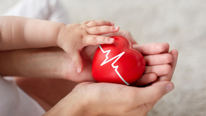 Heart held in hands