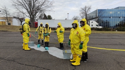 Emergency workers train in protective suits