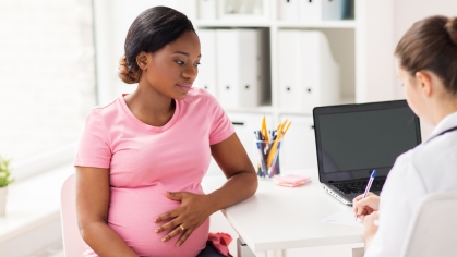 Pregnant woman with Doctor