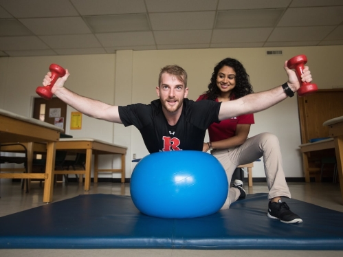 Physical therapy students practice training