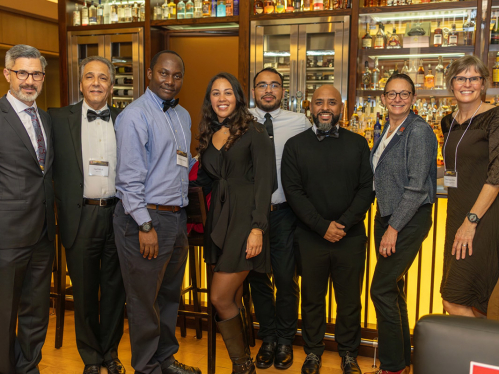 A group of people at the Chancellor's Awards ceremony