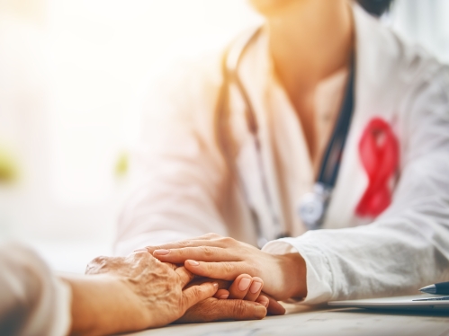 Oncologist consoling patient