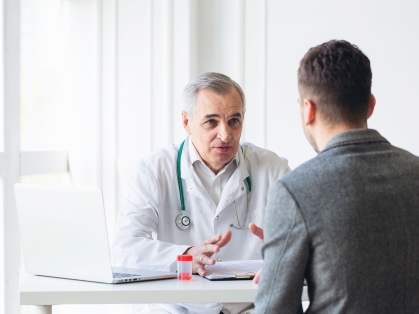patient consults with doctor