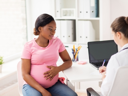 Pregnant woman with Doctor