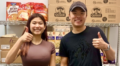 Emily Zhang and Ruey Horng Chee volunteer at RBHS Food Pantry