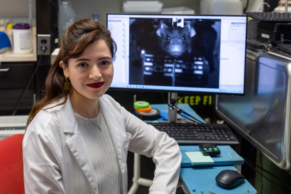 picture of researcher in front of their computer
