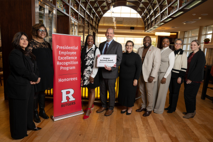 (l. to r.) Advocacy, Outreach, & Support (DOS-AOS) team PEER Honorees Pamela Harris, office manager and administrative assistant, Jeff Broggi, senior associate dean of students, Sandra (Rocio) Castro, associate dean of students, Halston Fleming, associate dean for case management, Victoria Miller-Butcher, assistant dean for case management, Elizabeth O'Connell-Ganges, associate dean for student success, Lauren Kerton, senior coordinator.