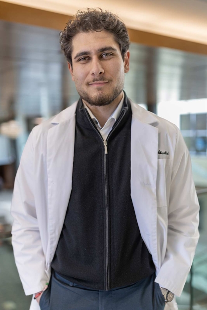 Truman Scholar Omar M. Abuattieh stands in the atrium of the Ernest Mario School of Pharmacy.