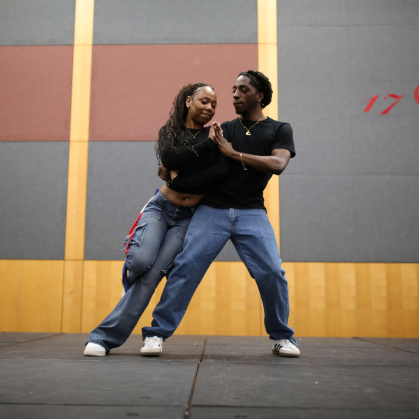 Bachata dancers and Rutgers students Keona Solano and Wendell LeFevre perform in the College Avenue Student Center during Rutgers Day.