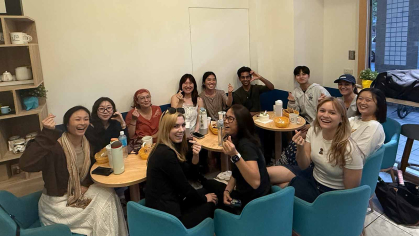 Rutgers graduate Deepak Gopalakrishnan (back row, right of center) and several other Yilan County English teaching assistants celebrate his birthday at a local cafe.