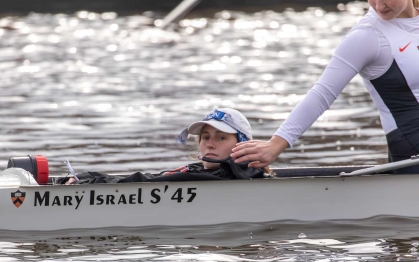 On Lake Carnegie at Princeton University, Hailey Sulzbach gets a pat on the shoulder from another member of the Princeton women's rowing team.