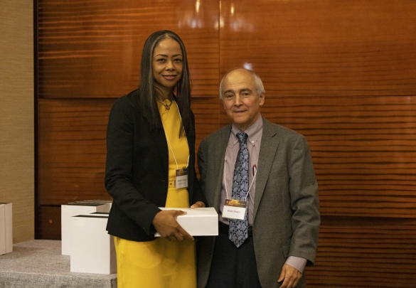 Marsha Gordon, recipient of the Staff Mentoring Award, and Senior Vice Chancellor Bishr Omary.
