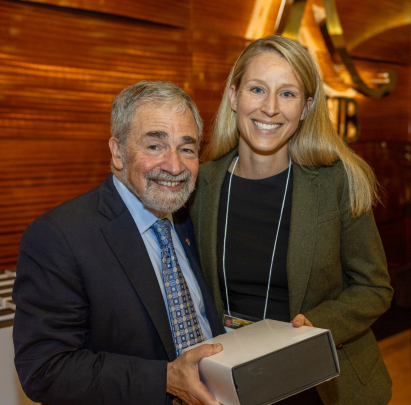 Chancellor Strom and Greta A. Bushnell, recipient of the Excellence in Clinical or Health Sciences Research Award – Early Career Investigator.
