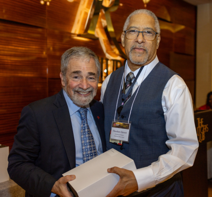 Chancellor Strom and Theodore Barrett, recipient of the Excellence in Clinical or Healthcare Delivery Award.