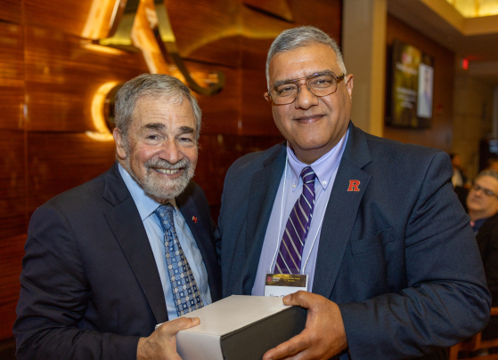 Chancellor Strom and Vern Chhibber, recipient of the Emerging Leader Award.