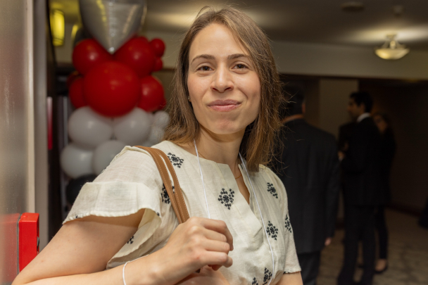 A medical student smiles for a photo at the Rising Star Ceremony in Newark.