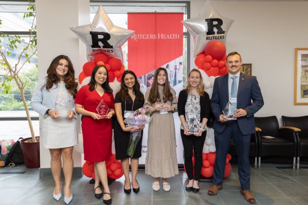 A group photo of the 2026 Rising Star recipients with their awards at the ceremony in New Brunswick.