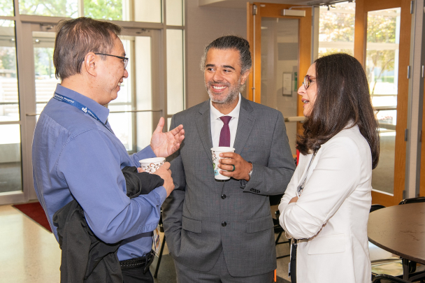 Attendees mingle and talk at the 2026 Integration Summit in Newark