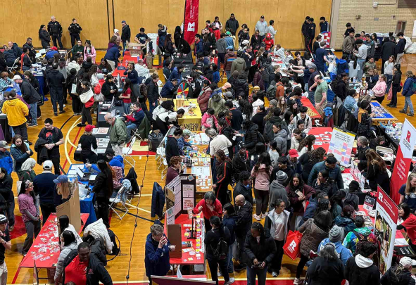 Crowds of people fill the College Avenue Gymnasium during Rutgers Day 2026 on Saturday.