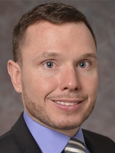 headshot of Adam Gormley