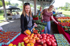 Rutgers Gardens staff and students sell freshly harvested produce, including peppers, at the Rutgers Farmers Market